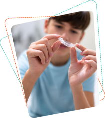 Teen using Invisalign aligners