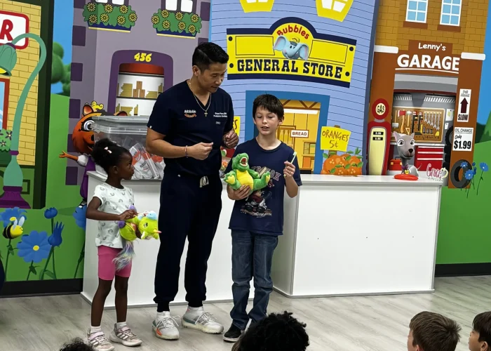 Fun Demonstrations with Big Smiles and Big Toothbrushes